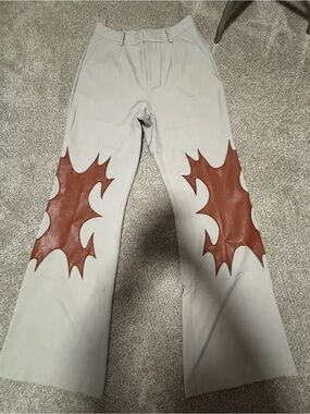 Fashion Nova Cream Trousers with Brown Flame Knee Patches